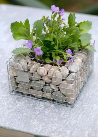 creative stone flower pot ideas 10