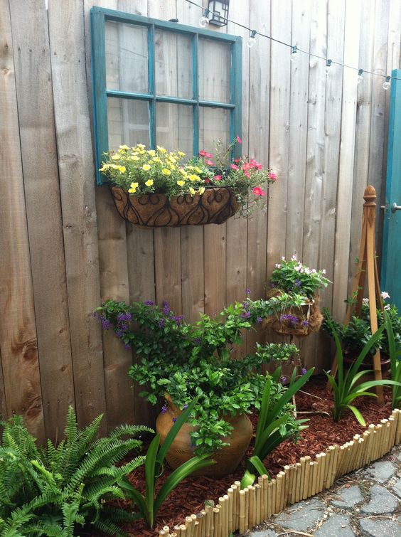 fence ideas decorated with small gardens
