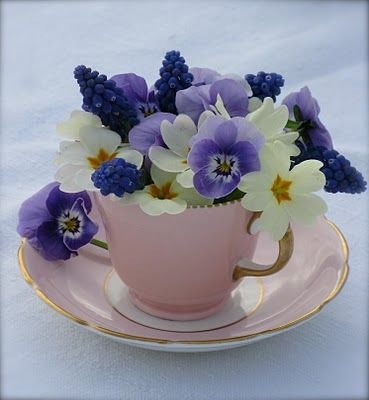 flower arrangements in cups 6