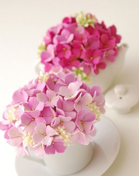 flower arrangements in cups 9