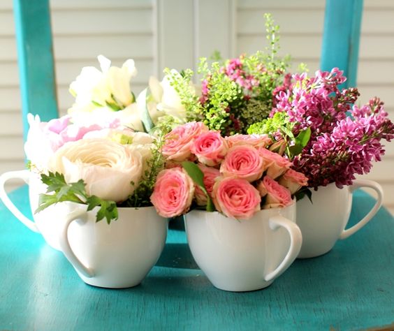 flower arrangements in cups