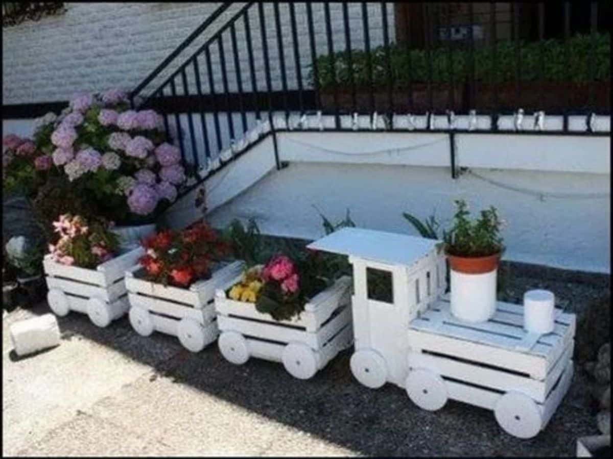 garden decoration with wooden crates 11