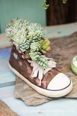 plant pots with old shoes 1